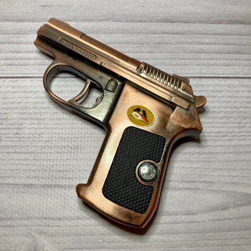Запальничка пістолет із лазерним прицілом smith & wesson D25 D25 фото